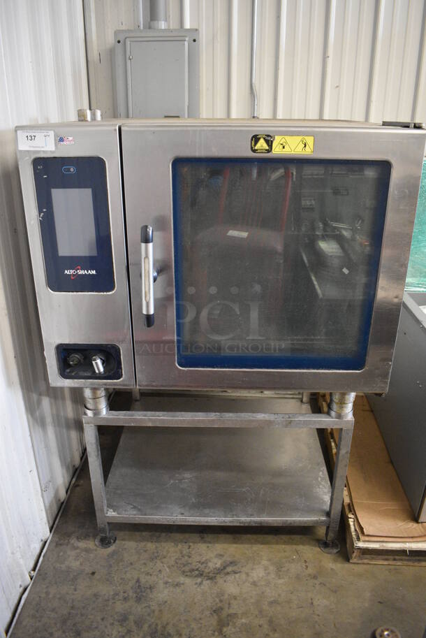 2015 Alto Shaam Model CTP7-20E Stainless Steel Commercial Combitherm Convection Oven on Stainless Steel Commercial Equipment Stand. 208-240 Volts, 3 Phase. 44x40x64