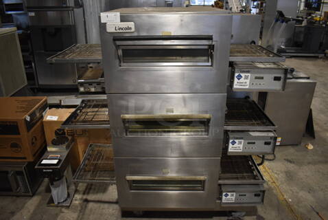 3 Lincoln Impinger Stainless Steel Commercial Electric Powered Conveyor Pizza Oven on Commercial Casters. 120/208 Volts, 3 Phase. 60x37x62. 3 Times Your Bid!