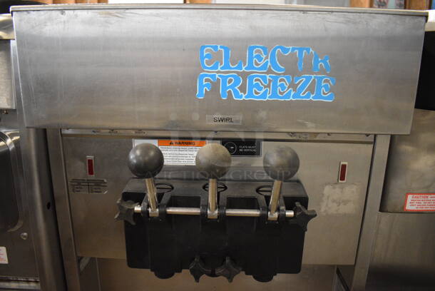 Electro Freeze Model SL500-232 Stainless Steel Commercial Floor Style Air Cooled 2 Flavor w/ Twist Soft Serve Ice Cream Machine on Commercial Casters. 208-230 Volts, 3 Phase. 22x34x60 - Image 4 of 7