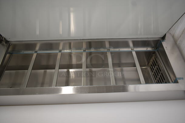 BRAND NEW SCRATCH AND DENT! 2023 Avantco 178SSPPT3 Stainless Steel Commercial Pizza Prep Table on Commercial Casters. 115 Volts, 1 Phase. Tested and Working! - Image 5 of 11