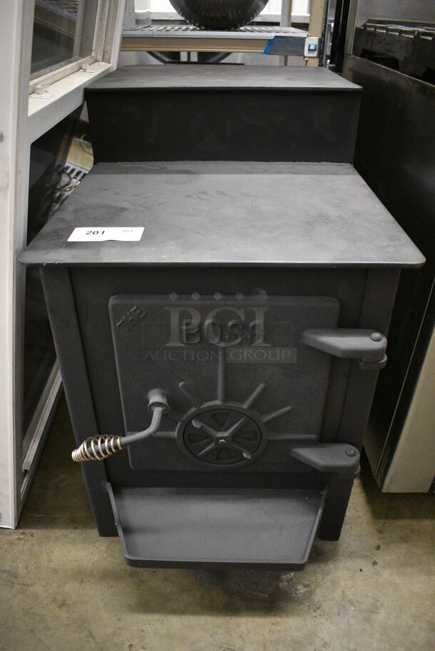 The Boss Black Metal Wood Stove. 21x41x31