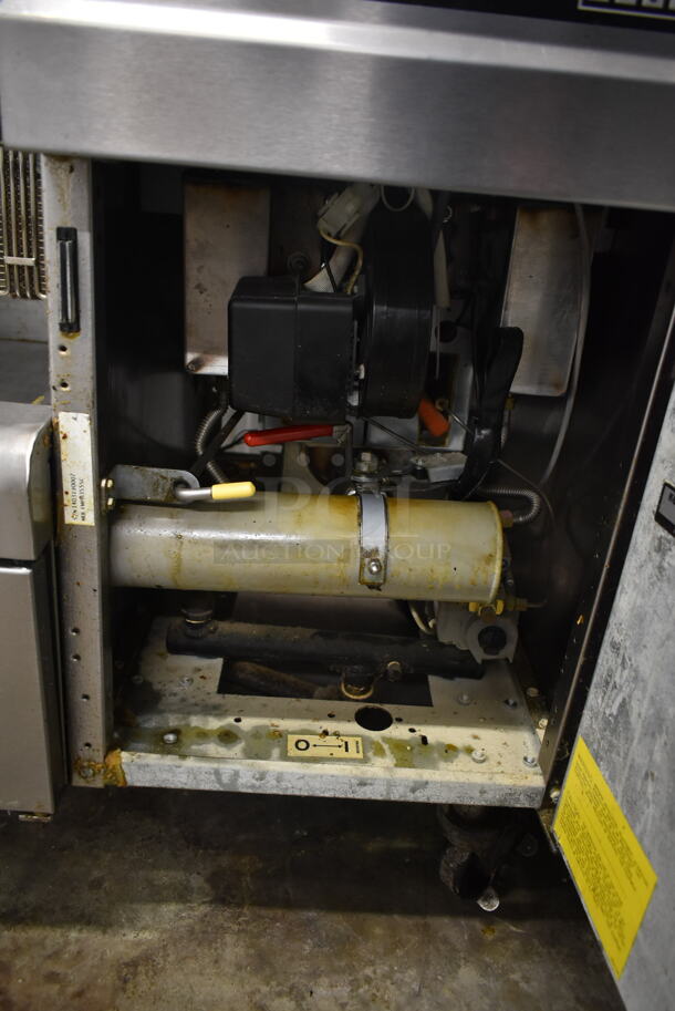 2014 Frymaster FMPH355SC Stainless Steel Commercial Floor Style 3 Bay Deep Fat Fryer w/ Fry Basket Hanging Station and 14 Metal Fry Baskets on Commercial Casters. 80,000 BTU. Unit Was Working When Removed. - Image 11 of 12