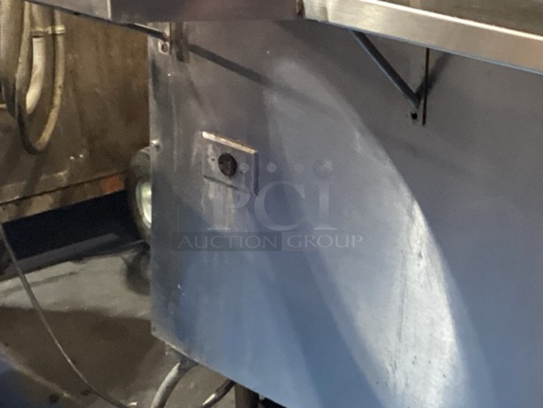 Randell Stainless Steel Dual-Sided Refridgerated Work Island, Multi-Pan Prep Table W/Two -Door and Two Drawers  Refrigerated Storage. Tested And Working. 84 x  46/52 x 58.
 - Image 5 of 11