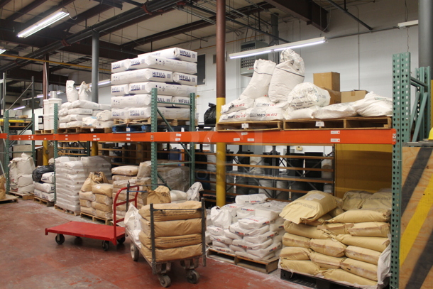 ALL ONE MONEY! Lot of Orange and Green Metal Pallet Racking. Does Not Include Contents. BUYER MUST REMOVE. - Image 1 of 5