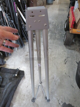 One Tripod Stand.