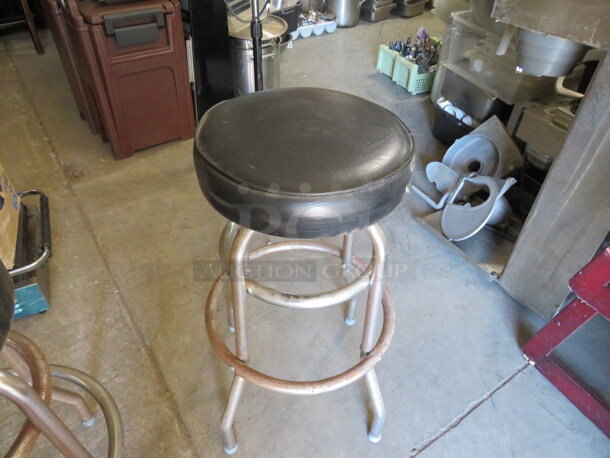 Chrome Bar Height Stool With Black Cushioned Seat And Footrest. 2XBID