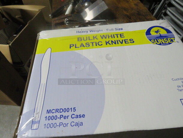 One NEW  Opened Box Of Heavyweight White Forks/Knives. 