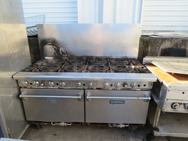 One Imperial 10 Burner Natural Gas Range, On Casters. No Bottom Plate. 60X32X57