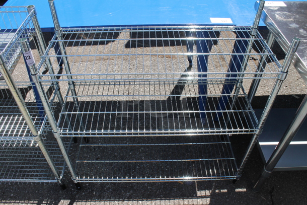 Chrome Finish 3 Tier Wire Shelving Unit. BUYER MUST DISMANTLE. PCI CANNOT DISMANTLE FOR SHIPPING. PLEASE CONSIDER FREIGHT CHARGES.
 - Image 1 of 2