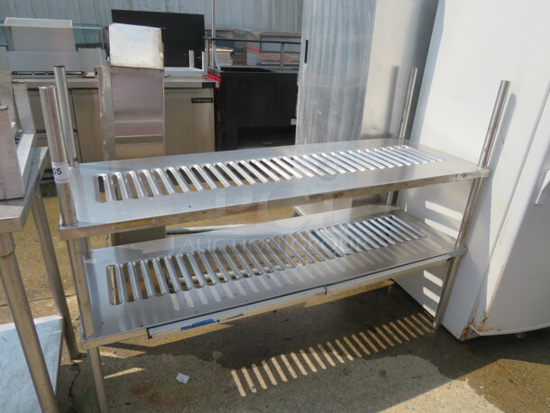One Stainless Steel Shelving With 2 Shelves And 2-24 Inch Ticket Rails. 60X21X45 - Image 1 of 1