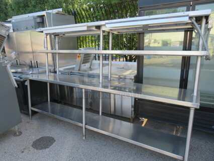 One Stainless Steel Table With Stainless Undershelf, 2 Stainless Overshelves, 2-36 Inch Ticket rails, And 4 Hatco Warmers. 108X24X65