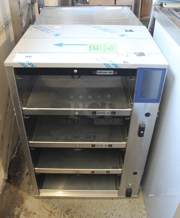 BRAND NEW! 2022 Duke RFHU-42-120H2 Stainless Steel Commercial Countertop 4 Tier Warming Holding Display Case. 120 Volts, 1 Phase. Tested and Working! - Image 1 of 8