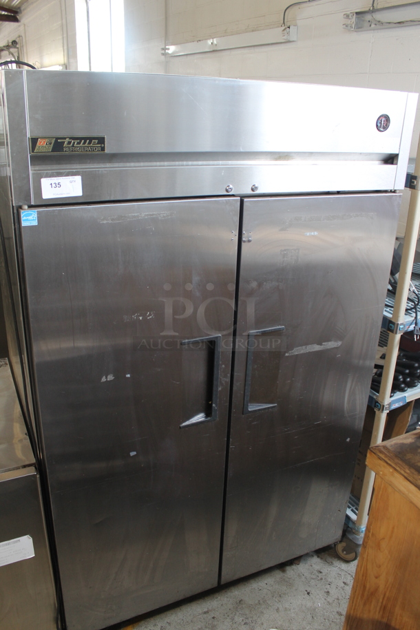 2013 True TG2R-2S ENERGY STAR Stainless Steel Commercial 2 Door Reach In Cooler w/ Poly Coated Racks on Commercial Casters. 115 Volts, 1 Phase. Tested and Working! - Image 1 of 11