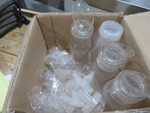 One Lot Of NEW And Used Squeeze Bottles And Lids.