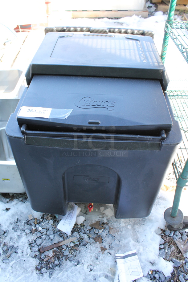 Choice Black Poly Insulated Portable Ice Bin on Commercial Casters.