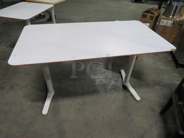 One White Laminate Table Top On A Dual Pedestal Base. 51X28X29