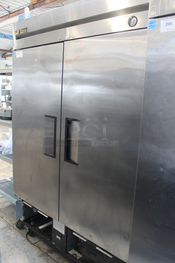 2014 True T-49F ENERGY STAR Stainless Steel Commercial Two Door Reach In Freezer w/ Poly Coated Racks on Commercial Casters. 115 Volts, 1 Phase. Tested and Working! - Image 1 of 9