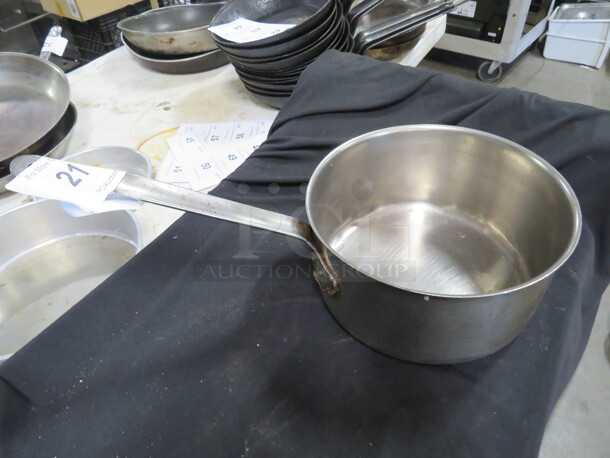 One Stainless Steel Sauce Pot. 9.5X