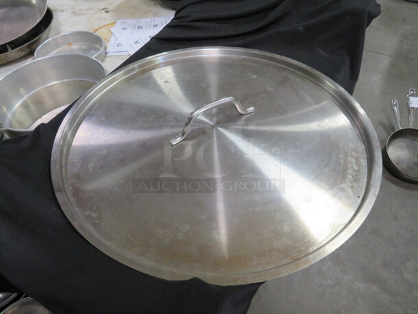 One 20 Inch Stainless Steel Lid.