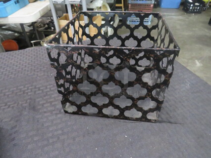 One 7X7X6 Metal Holder.