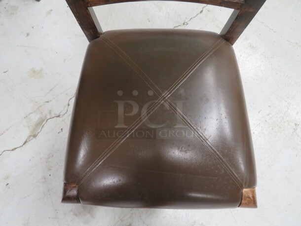 One Wooden Chair In A Dark Finish With A Brown Cushioned Seat.  - Image 3 of 3
