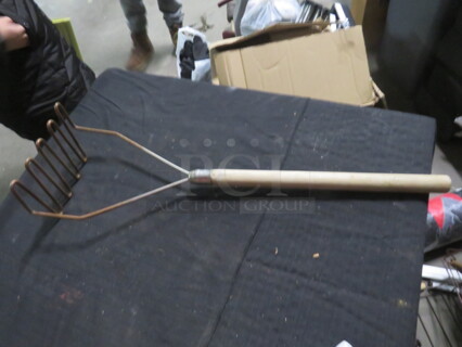 One Commercial Potato Masher.