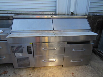 One Stainless Steel Randell 4 Drawer Refrigerated Prep Table With Cutting Board On Casters. Drawers Need Parts To Attach. Working! Model# 51368PR. 115 Volt. 72X35X48