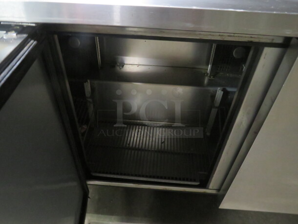 One WORKING 3 Door TRUE Refrigerated Prep Table On Casters. 115 Volt. Model# TSSU-72-18. 72X30X43 - Image 4 of 5