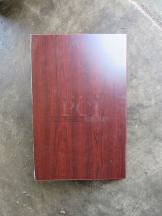 One 24X15X9 Wooden Shelf With Bracket.