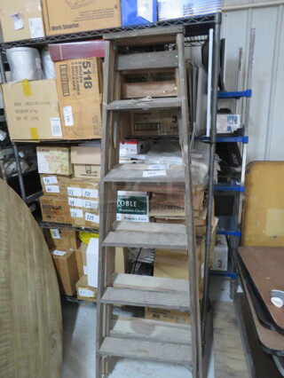 One 6 Ft Davidson Wooden Ladder.