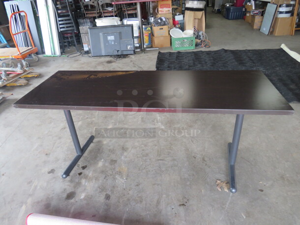 One Brown Laminate Folding Table With Metal Legs. 66X24X29