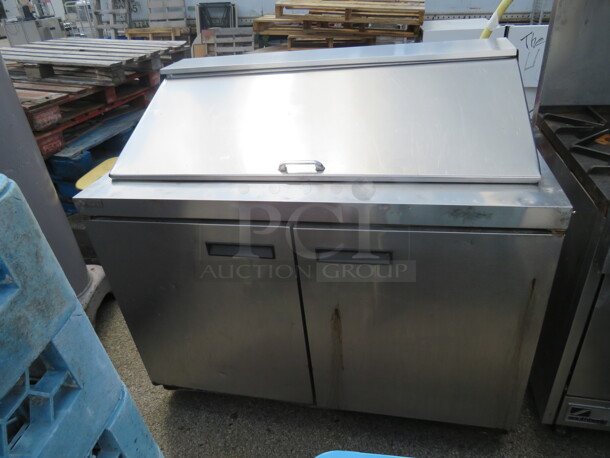 One 2 Door Delfield Refrigerated Prep Table With 2 Racks On Casters. WORKING!  #4448N-18M. 115 Volt. 48X32X45