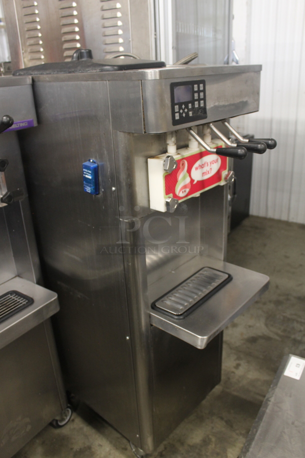 2014 Stoelting F231-18I2-OT2 Stainless Steel Commercial Floor Style Water Cooled 2 Flavor w/ Twist Soft Serve Ice Cream Machine on Commercial Casters. 208-240 Volts, 1 Phase.  - Image 2 of 6