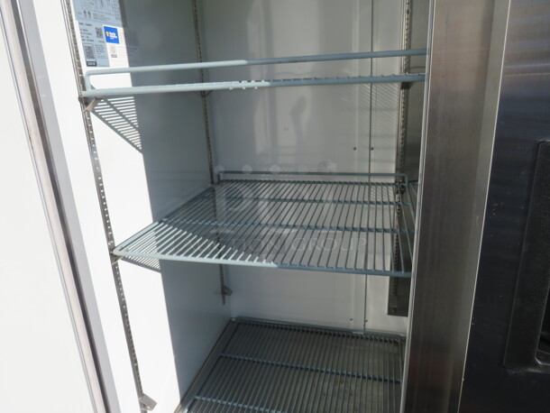 One Avantco 2 Door Stainless Steel Freezer With 6 Rack On Casters. Model# 178A49FHC. 115 Volt. 54X32X82.5 - Image 2 of 3