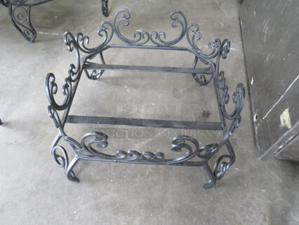 One Black Metal Beverage Dispenser Stand.