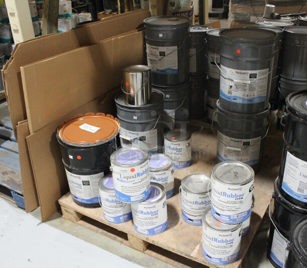 ALL ONE MONEY! TWO PALLET LOT of Various Items Including Pro Guard Liquid Rubber and Cardboard. BUYER MUST REMOVE. - Image 1 of 5