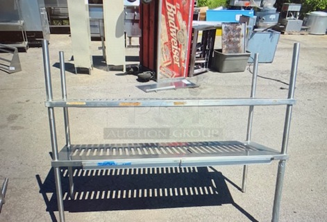 Stainless Steel Shelving With 2 Shelves, And 2 24 Inch Ticket Rails. 60X20.5X45