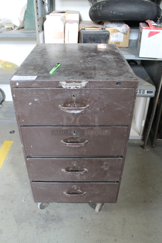 Brown Metal 4 Drawer Filing Cabinet on Commercial Casters. BUYER MUST REMOVE.