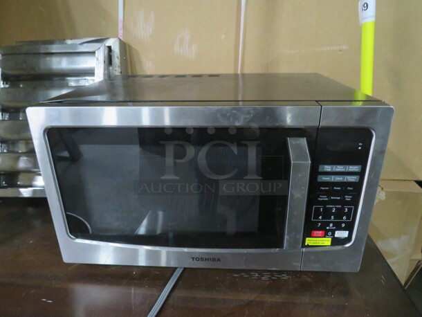 One Stainless Steel Toshiba Microwave. 120 Volt. Model# ML2 EM31PA. 20X15X12