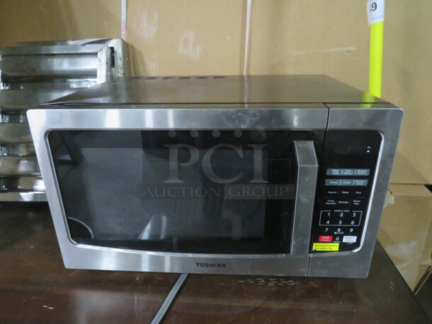 One Stainless Steel Toshiba Microwave. 120 Volt. Model# ML2 EM31PA. 20X15X12 - Image 1 of 2