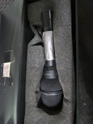 One Electro Voice Microphone.