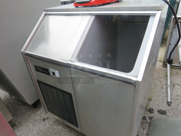 One Ice O Matic Air Cooled FLAKER Ice Machine And Bin. Model# EF250A32S. 115 Volt. 32X28.5X41