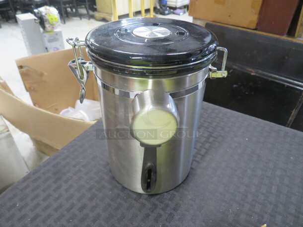 One NEW Stainless Steel Coffee Canister.