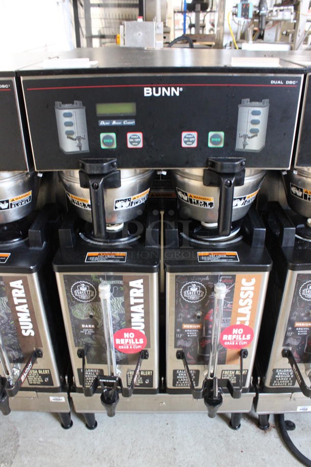 2012 Bunn Model DUAL SH DBC Stainless Steel Commercial Countertop Dual Coffee Machine w/ 2 Stainless Steel Brew Baskets and 2 Bunn Model SH SERVER Satellite Servers. 120/208-240 Volts, 1 Phase. 18x24x36. Tested and Working!