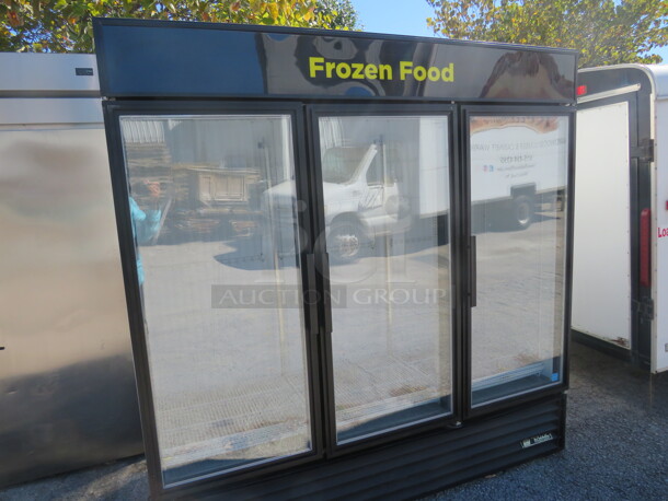 One True 3 Door Glass Merchandiser Freezer With 12 Racks. Model# GDM-72F-LD. 115/208-230 Volt. 1 Phase. 