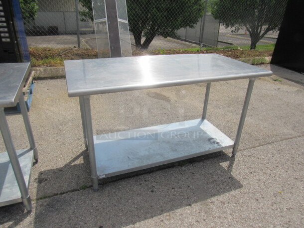 One Stainless Steel Table with Under Shelf. 60X30X34