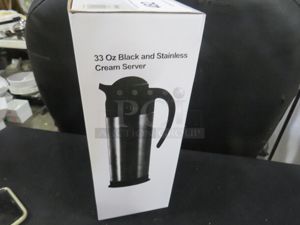One NEW 33oz Stainless Steel Creamer. #CRSV-33.  - Image 1 of 1