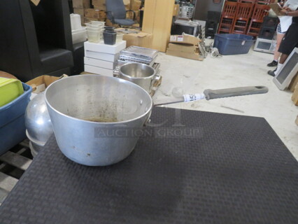 One Aluminum 7 Quart Vollrath Sauce Pan.