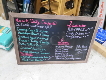 One 35X23 Wood Framed Chalkboard.