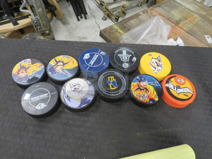 One Lot Of Assorted Hockey Pucks.